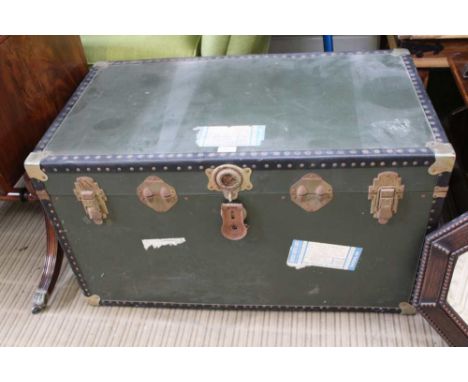 A LARGE BOX FORMED STEAMER TRUNK 