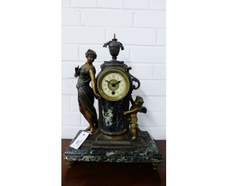 French patinated metal and marble mantle clock, the brass cased circular dial flanked by a classical maiden and cherub, with 