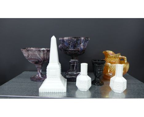 A quantity of 19th century and later decorative glass to include amethyst slag glass bowls, figural candlestick, white opaque