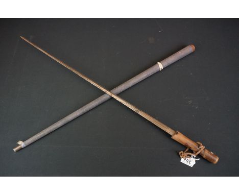 A vintage wooden handled sword stick (A/F). 