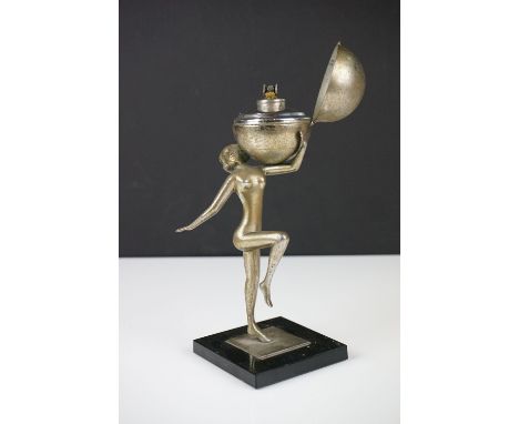 Art Deco Lady &amp; Globe Metal Table Lighter, raised on a square base, approx 18cm high 