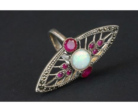 Silver dress ring with central opal panel and rubellite stones 