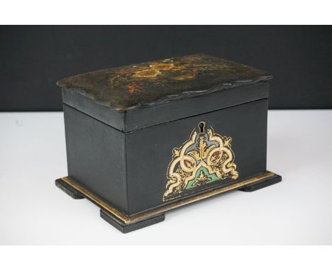 Late 19th / Early 20th Century black lacquered twin compartment tea caddy of rectangular form, with painted floral and scroll
