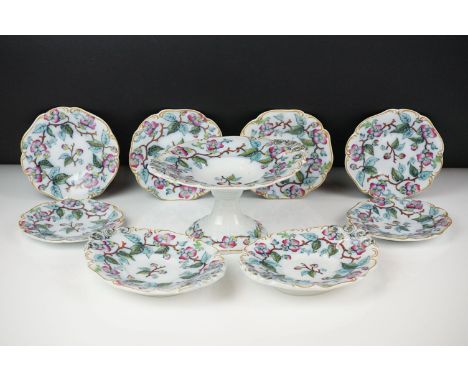 19th century Child's Ceramic Dessert Service decorated with pink flowers comprising a comport, 18cm wide, two oval serving pl