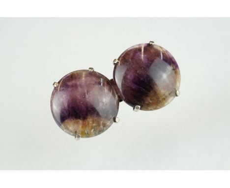 A vintage ladies brooch set with two Blue John cabochons. 