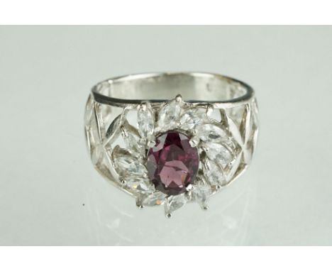 Silver and CZ dress ring with central amethyst panel 