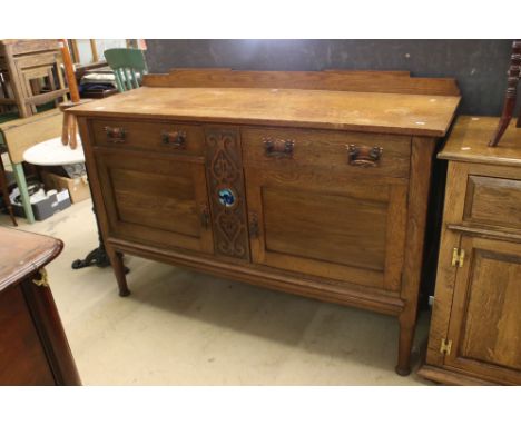 Early 20th century Art Nouveau Sideboard, the two drawers and cupboard doors with copper effect Art Nouveau handles, the cent