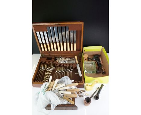 A Canteen of cutlery together with a selection of loose cutlery, a quantity of vintage pipes to include estate and clay examp