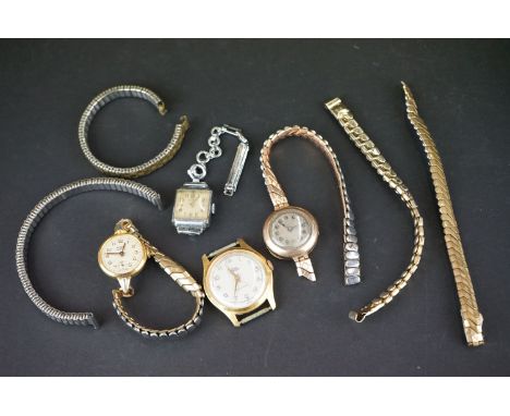 A small collection of ladies and gents vintage wristwatches to include a 9ct gold cased example. 