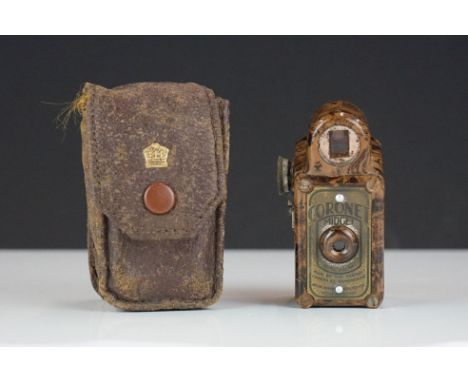 A Vintage Bakelite Coronet Midget camera complete with case. 
