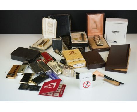 A collection of mainly vintage pocket cigarette lighters to include Dunhill and Calibri examples. 
