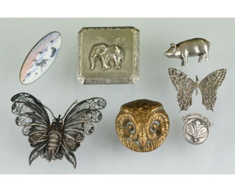 A Small collection of brooches to include a Norwegian sterling silver and enamel examples and a South African silver example.