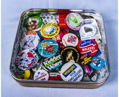 A collection of vintage badges