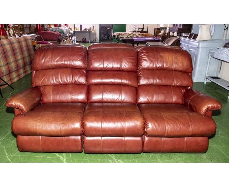 A La-Z-Boy red/brown three seater leather sofa, in very good condition