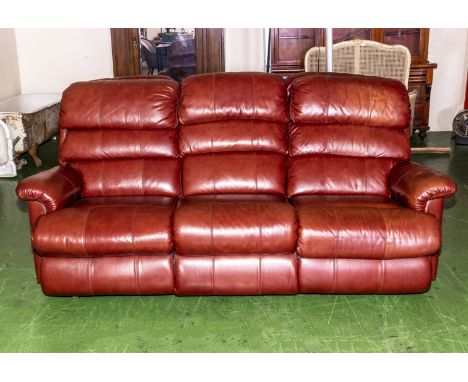 A La-Z-Boy red/brown three seater leather sofa, in very good condition