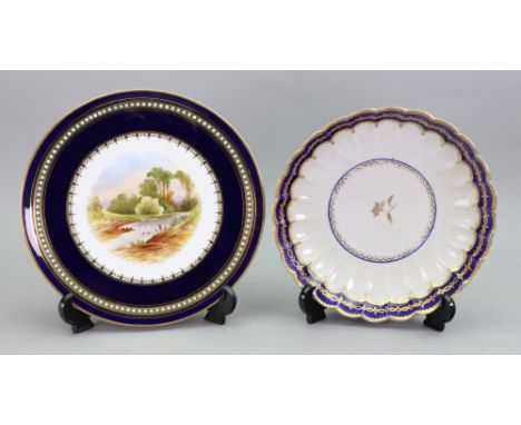 A Worcester porcelain fluted plate, circa 1780, with a central gilt flower sprig beneath a blue and gilt border, blue open cr