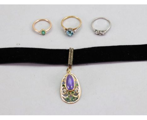 An opal and enamel pendant mounted to velvet choker, a three stone diamond ring, an 18ct gold blue Zircon single stone ring w