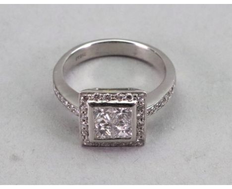 A platinum and diamond square cluster ring, rubover set with four princess cut diamonds to the centre in a surround of grain 