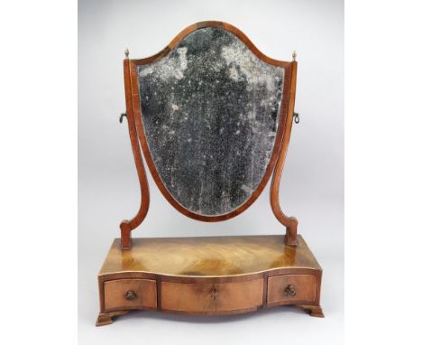 A George III style mahogany boxwood banded shield shape swing toilet mirror, 19th century, the serpentine fronted box plateau