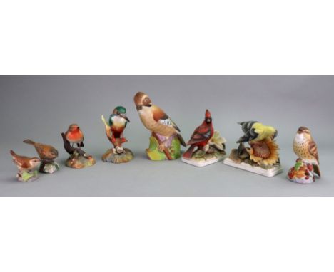 Two Royal Crown Derby figures of birds, Robin, 9.7cm high and Kingfisher, 14cm high, four Royal Worcester figures of birds, J