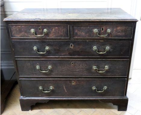 A George III oak chest, the moulded rectangular top above two short and three long drawers, on bracket feet, 90cm wide x 48cm