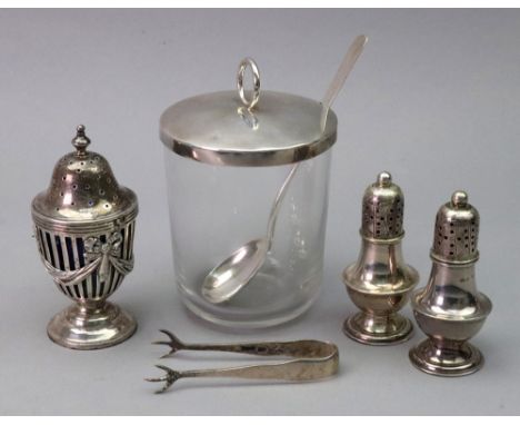 A George III style silver pepperette, Edward John &amp; Noble Haseler, Chester 1910, in classical style, slat pierced and emb