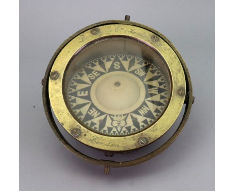 Davey &amp; Co (London) Ltd, a brass cased compass in gimble mount, 18.5cm diameter. 