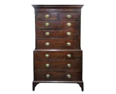 A George III mahogany tallboy chest, the moulded cornice above two short and three long drawers, the projecting base with thr
