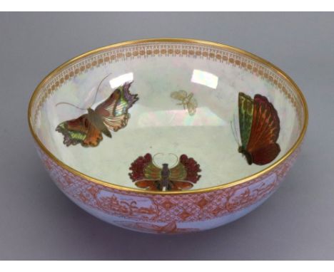 A Carltonware 'Butterfly' lustre bowl, 1920's, decorated to the interior with four colourful butterflies, the exterior with f