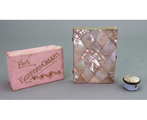 A set of twenty seven vintage dominoes, a Victorian mother of pearl diamond pattern note case, hinged and opening, the pink s
