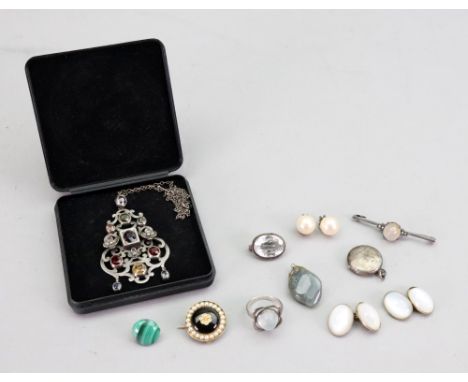 A collection of jewellery, comprising; an enamel and seed pearl mourning brooch, a gemset scroll and foliate designed pendant