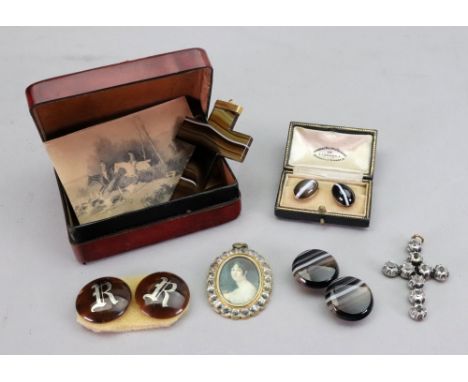 A gold top mounted agate cross, two pairs of agate studs, one with a box, a pair of tortoiseshell studs with the initial R mo