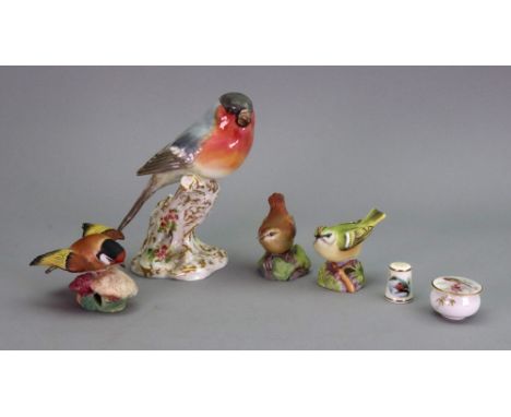 A Royal Worcester figure of a bullfinch, 2662, 25cm high and three others Wren, Goldfinch and Gold Crest, a small Royal Worce