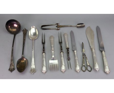 An Albany pattern electroplate part canteen, circa 1900, comprising: a soup ladle, 2 basting spoons, stilton scoop, grape she