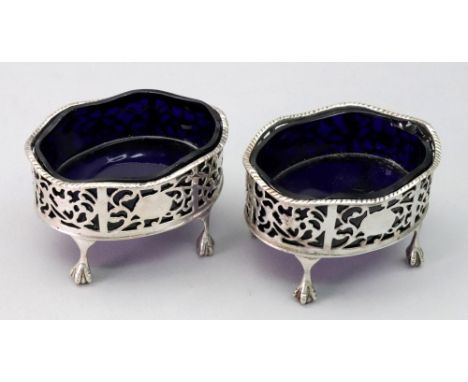 A pair of George IV Irish oval silver salt cellars, Dublin 1824, makers mark K S, the foliate pierced sides around a vacant c