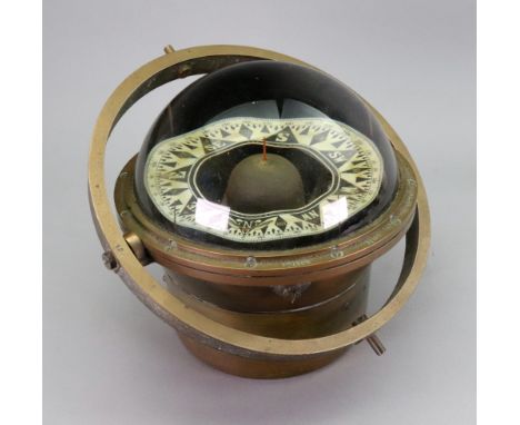 Kelvin &amp; Wilfrid.O.White Co. Boston and New York, U.S.A., a brass cased spherical compass ES323, with domed glass top and