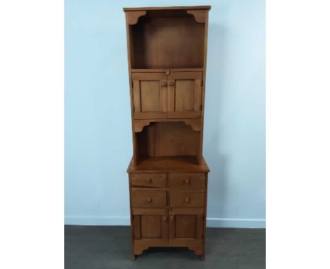 PINE DRESSER, with open shelf, two doors over base with four drawers and two cupboard doors182cm x 59cm