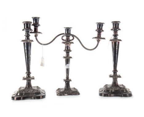 VICTORIAN CANDLESTICK GARNITURE, 19TH CENTURY comprising a twin-branch candelabrum and a pair of candlesticks, each with urn 