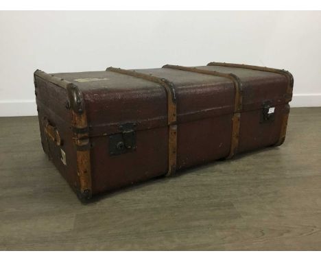 TRAVEL TRUNK, EARLY 20TH CENTURY wood bound with leather handles90cm wide