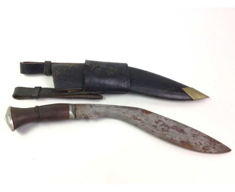 KUKRI WITH WOODEN HANDLE, in leather scabbard