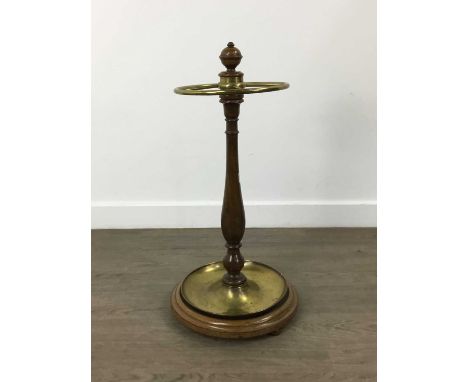 BRASS FOUR DIVISION STICK STAND, with oak support and circular base