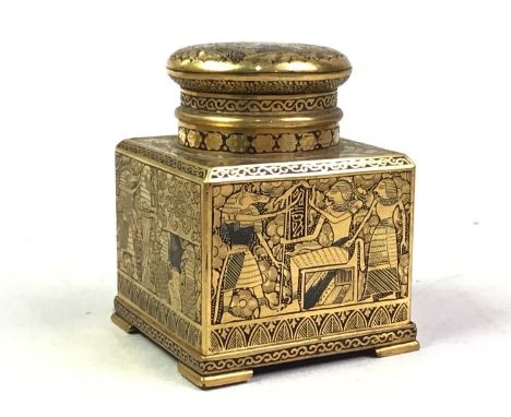 KOMAI-STYLE BRASS INKWELL AND DIP PEN, ALONG WITH A PEN BOX AND FURTHER the inkwell with Egyptian type decoration, circa 1930