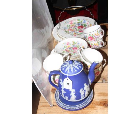 Twenty four pieces of Paragon china and a Wedgwood Blue Jasperware teapot and stand.