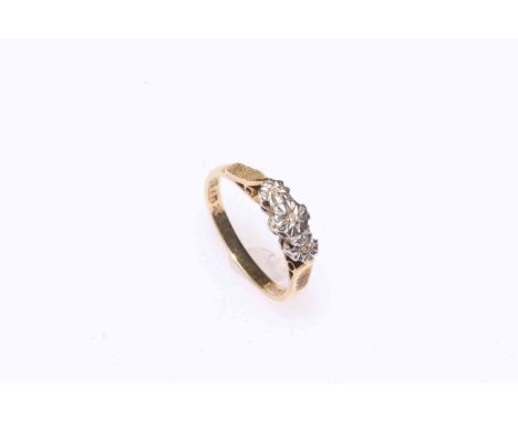 18 carat gold three stone illusion set diamond ring, size N.