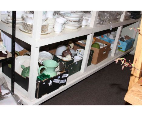 Large shelf collection of ceramics, glass, fabrics, quilts, linens, silver frame and spoon, vintage dolls and teddy.
