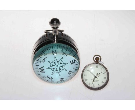 Spherical compass and smaller spherical clock.