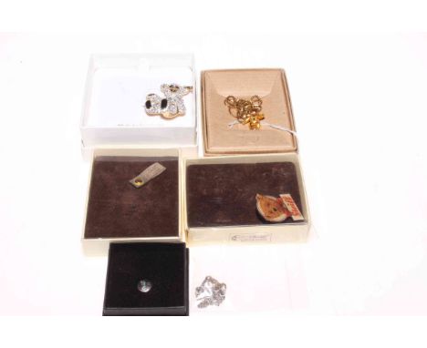 Swarovski Steiff teddy brooch and Steiff buttons and badge, and 9 carat gold chain with bear pendant.