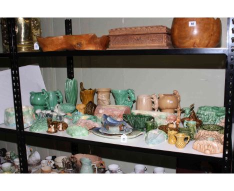 Shelf collection of Sylvac including wall plaques, planters, vases, jugs, etc.