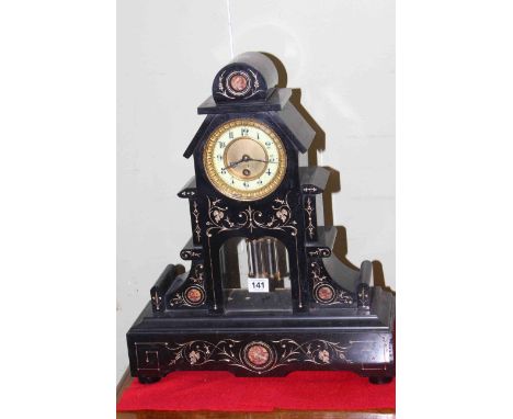 Victorian black marble clock with gilt incised decoration and exposed pendulum, 48cm.