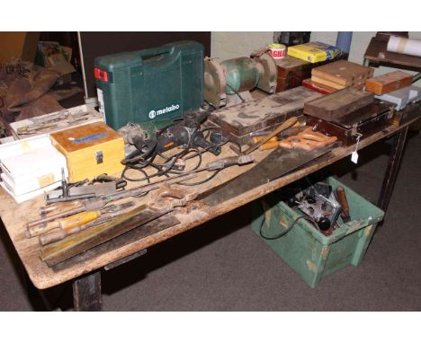 Collection of hand and power tools, chisels, saws, etc.